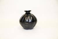 A Blackware Pottery Vase, Dona Rosa, Oaxaca, Mexico Height 5 1/2 inches.