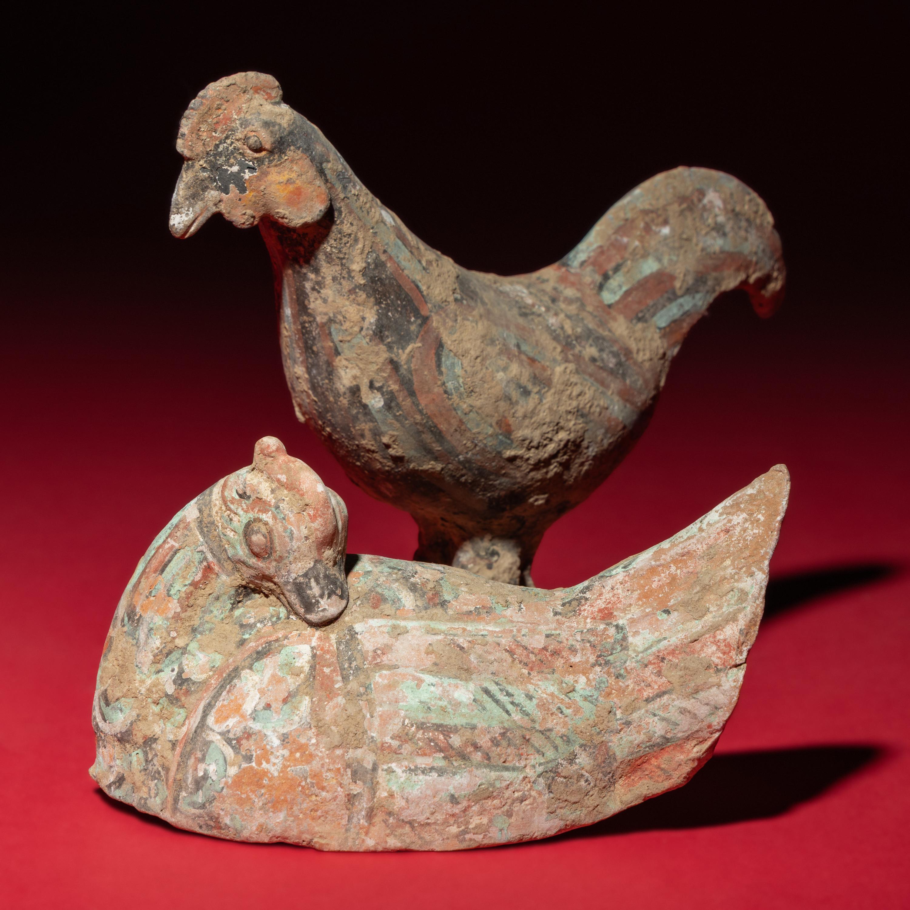 A Chinese Painted Pottery Mandarin Duck and a Cockerel, Han Dynasty — 漢 灰陶彩繪鴛鴦與小公雞