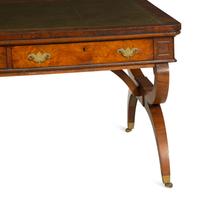 A Regency Burlwood Library Table with Black Leather Inset Top