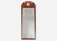 A Queen Anne fret-carved burl walnut and parcel-gilt looking glass, circa 1730-1750
