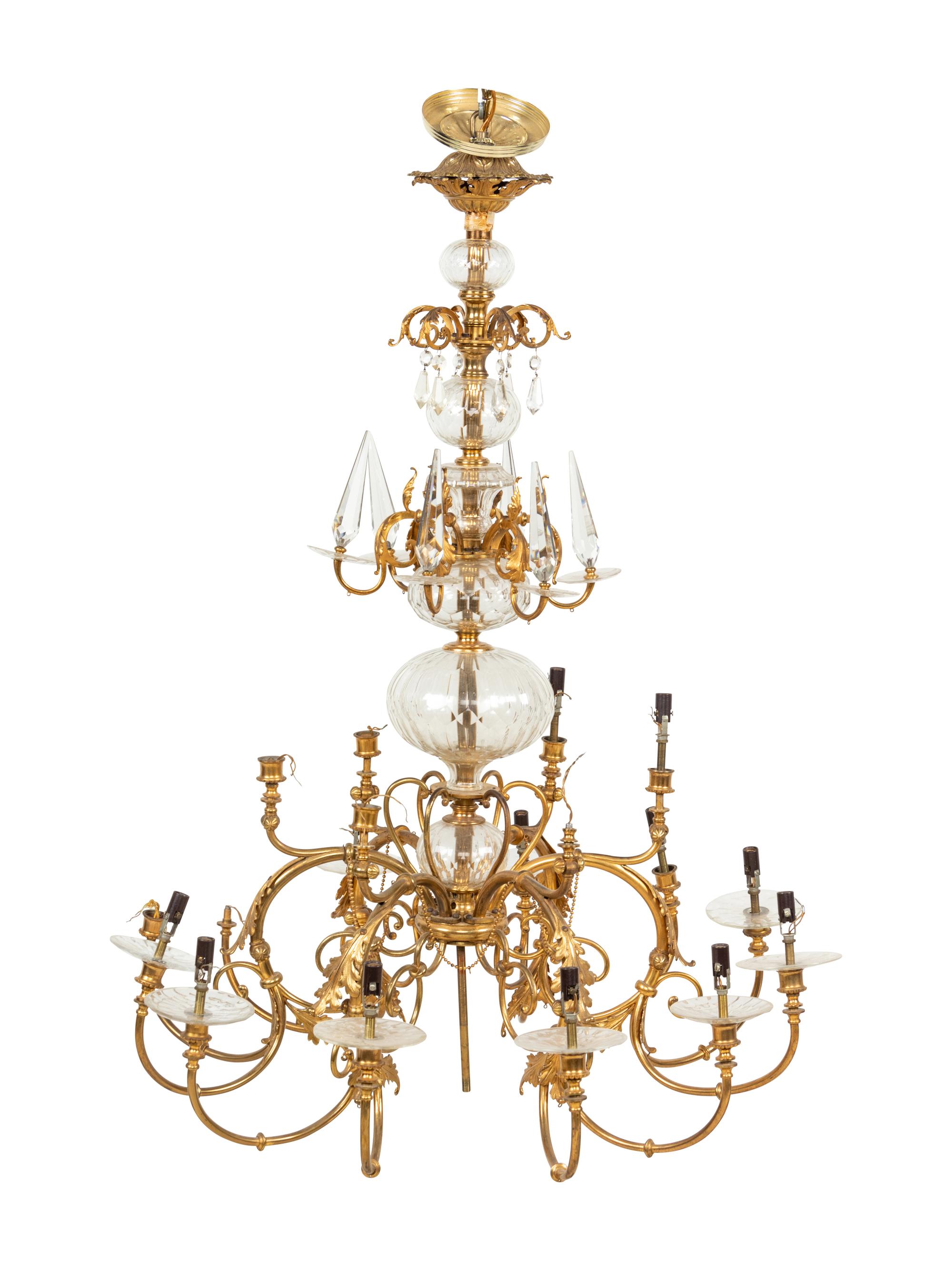 A Continental Brass and Glass Twelve-Light Chandelier