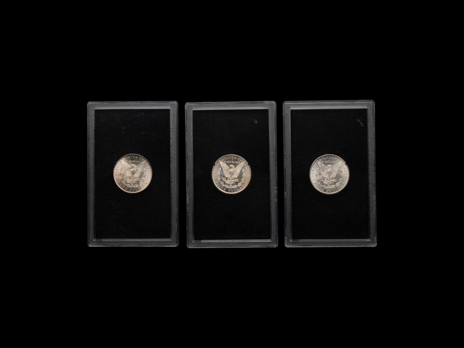 A Group of Three Carson City GSA: Morgan $1 Coins