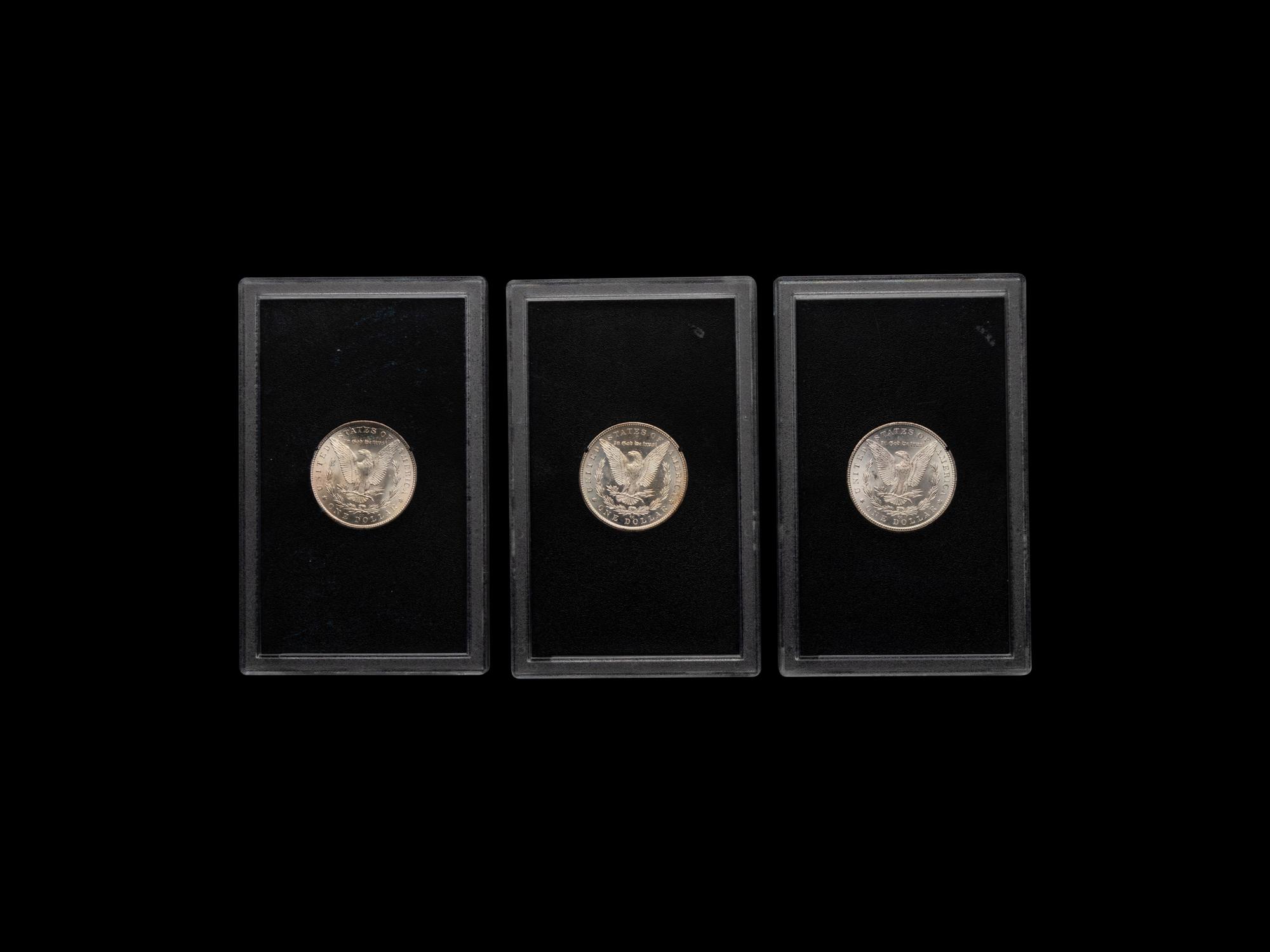 A Group of Three Carson City GSA: Morgan $1 Coins