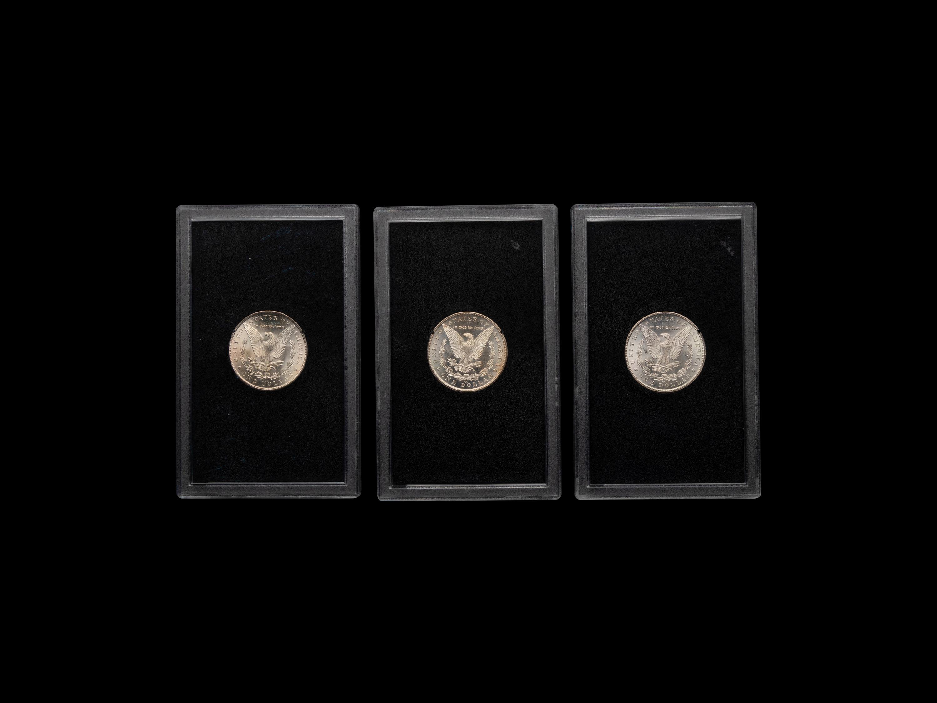 A Group of Three Carson City GSA: Morgan $1 Coins