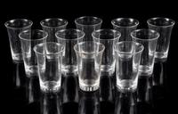 A Set of Twelve Steuben Short Glasses. Height 4 3/4 inches.