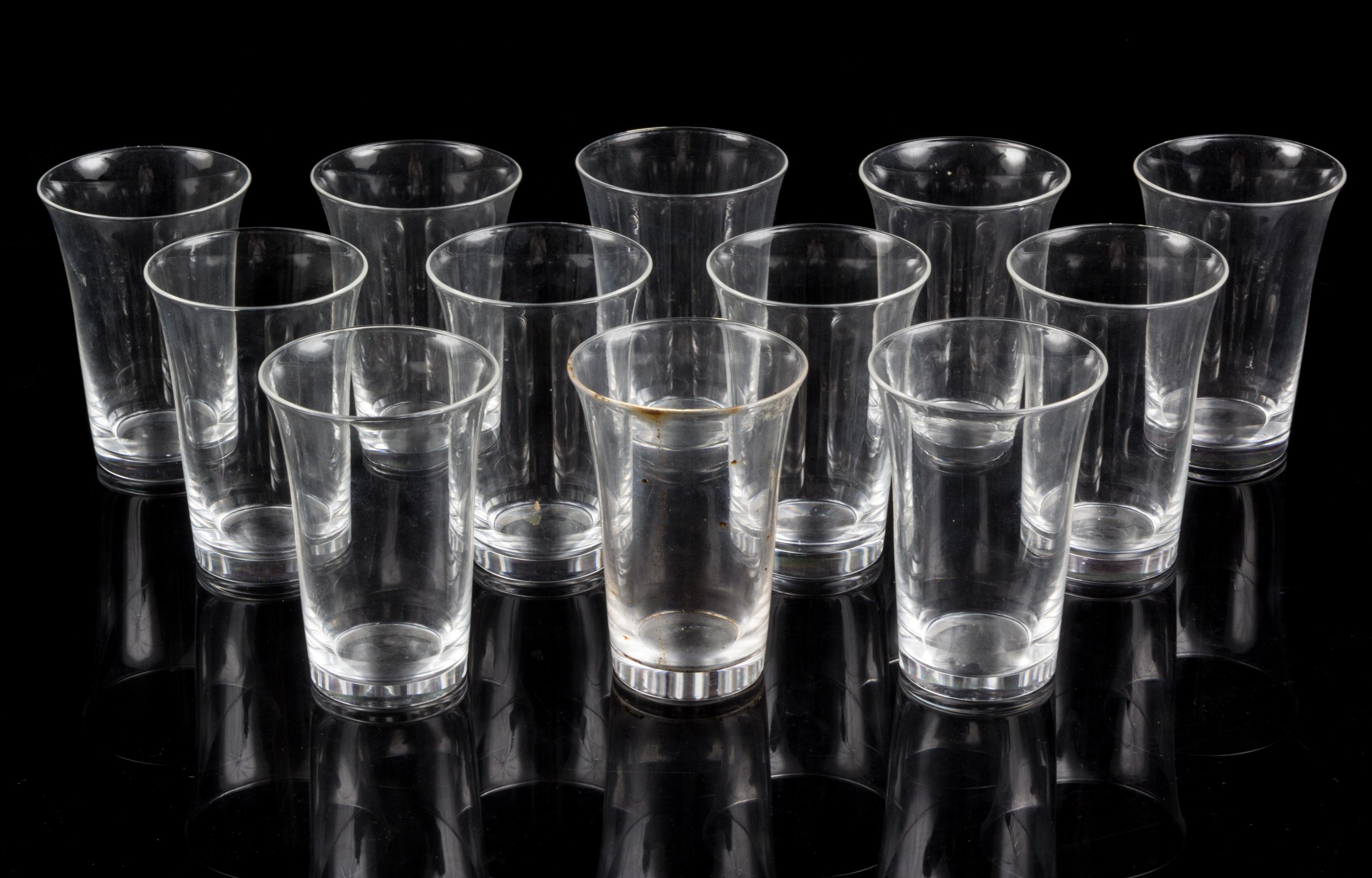 A Set of Twelve Steuben Short Glasses. Height 4 3/4 inches.