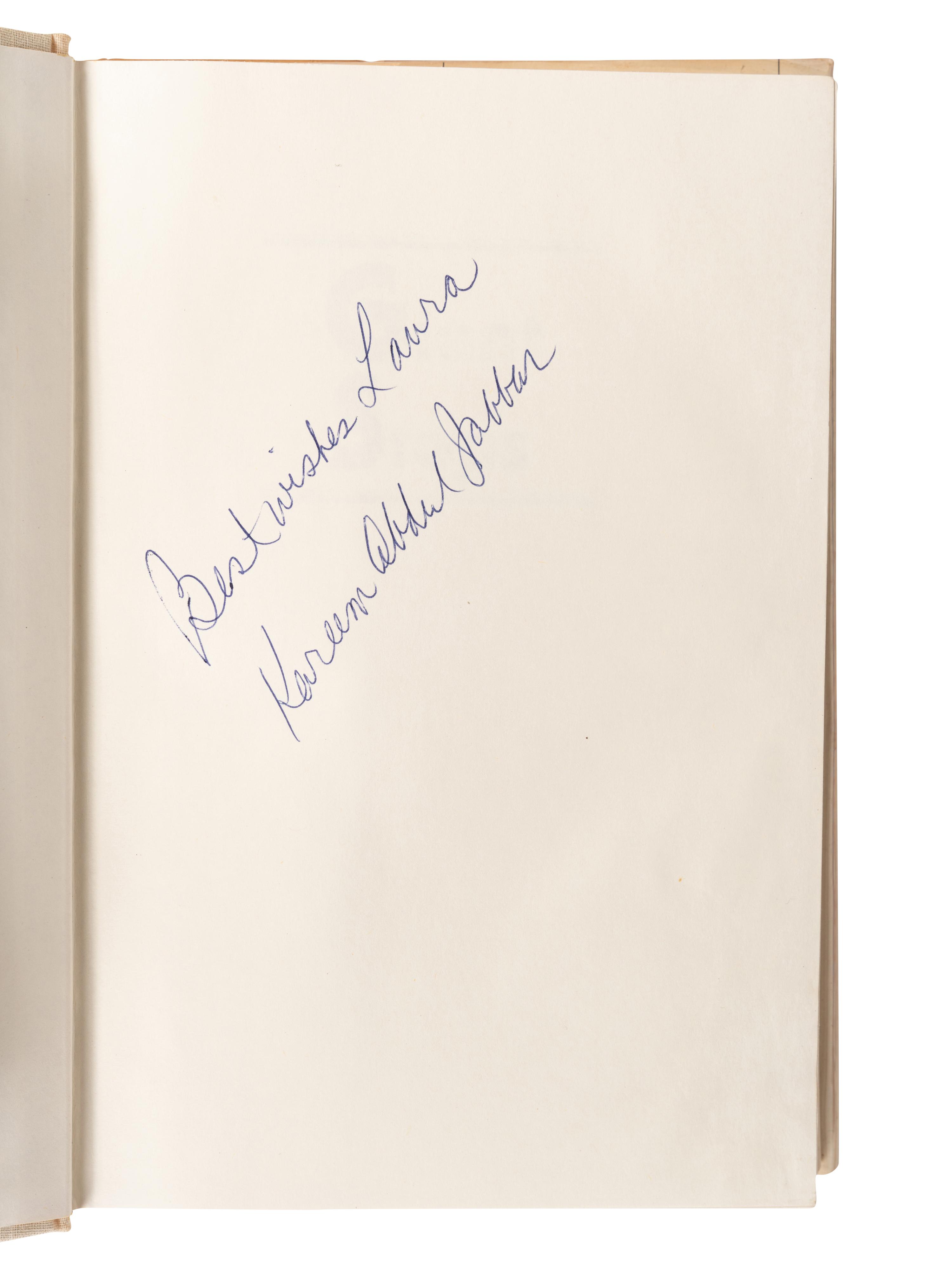 A Group of Nine Books on Basketball Including Signed Autograph Editions