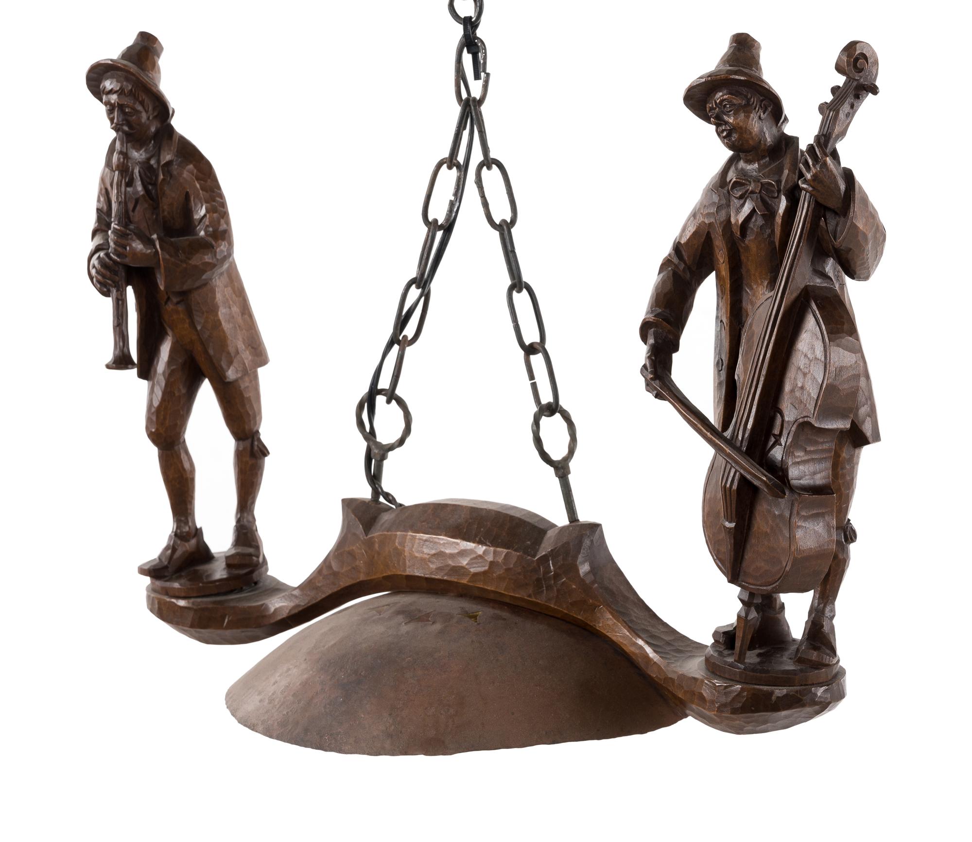 A Black Forest Carved Figural Single-Light Chandelier