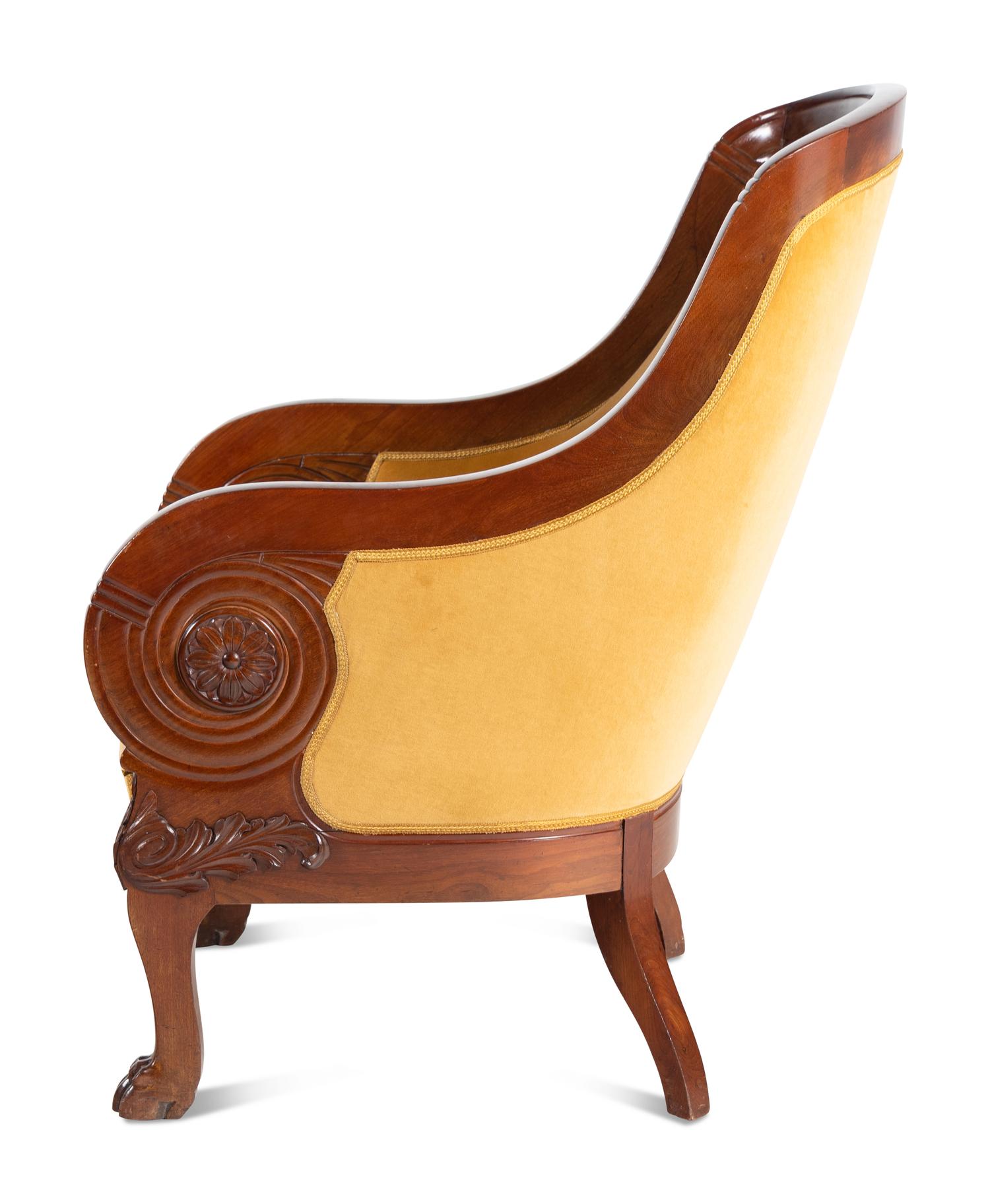 A Pair of Baltic Style Carved Walnut Bergères