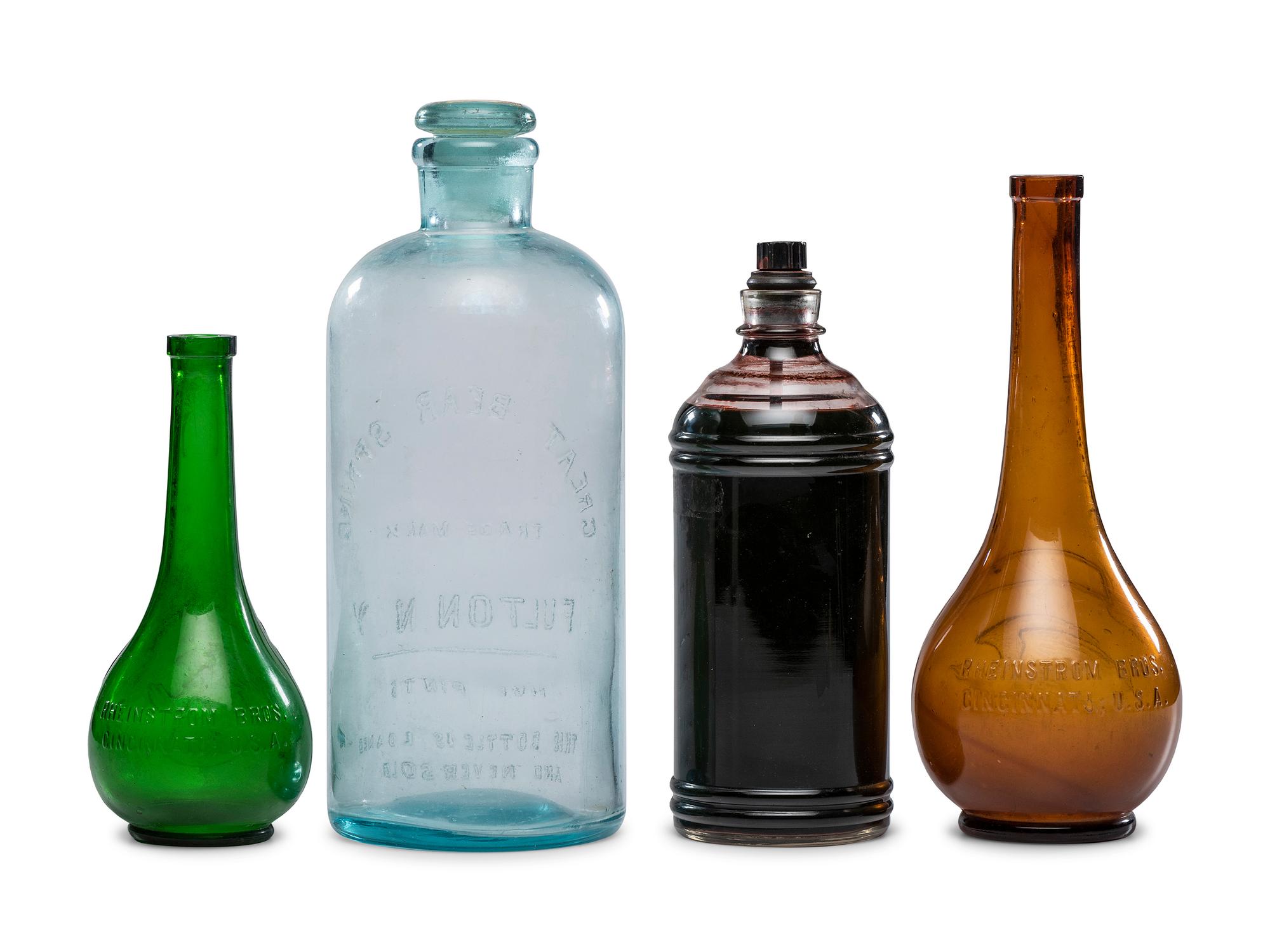 Four Glass Advertising Bottles