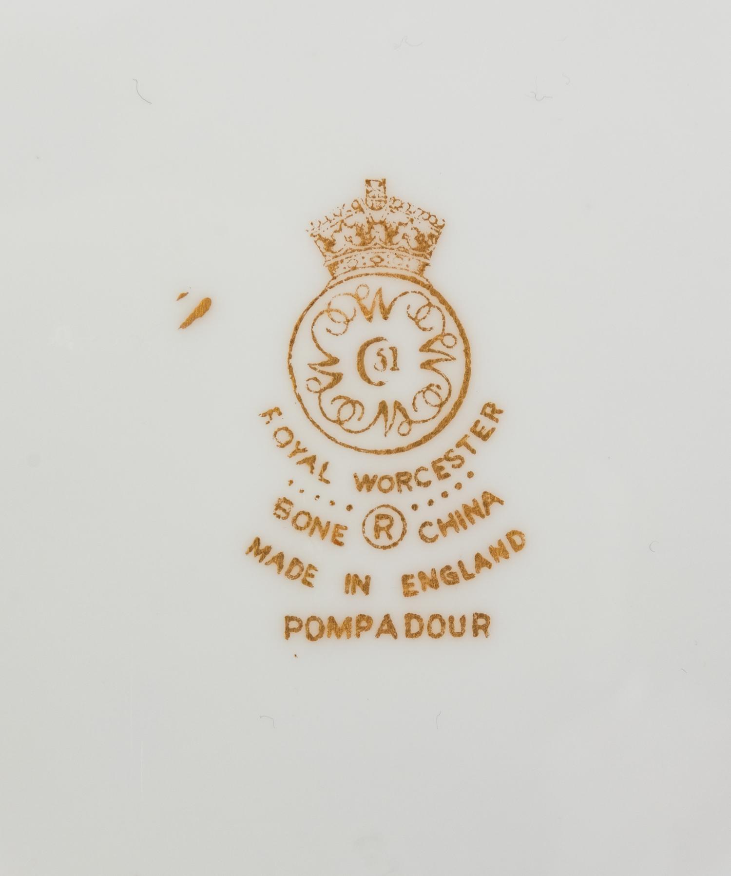 A Royal Worcester Pompadour Porcelain Dinner Service