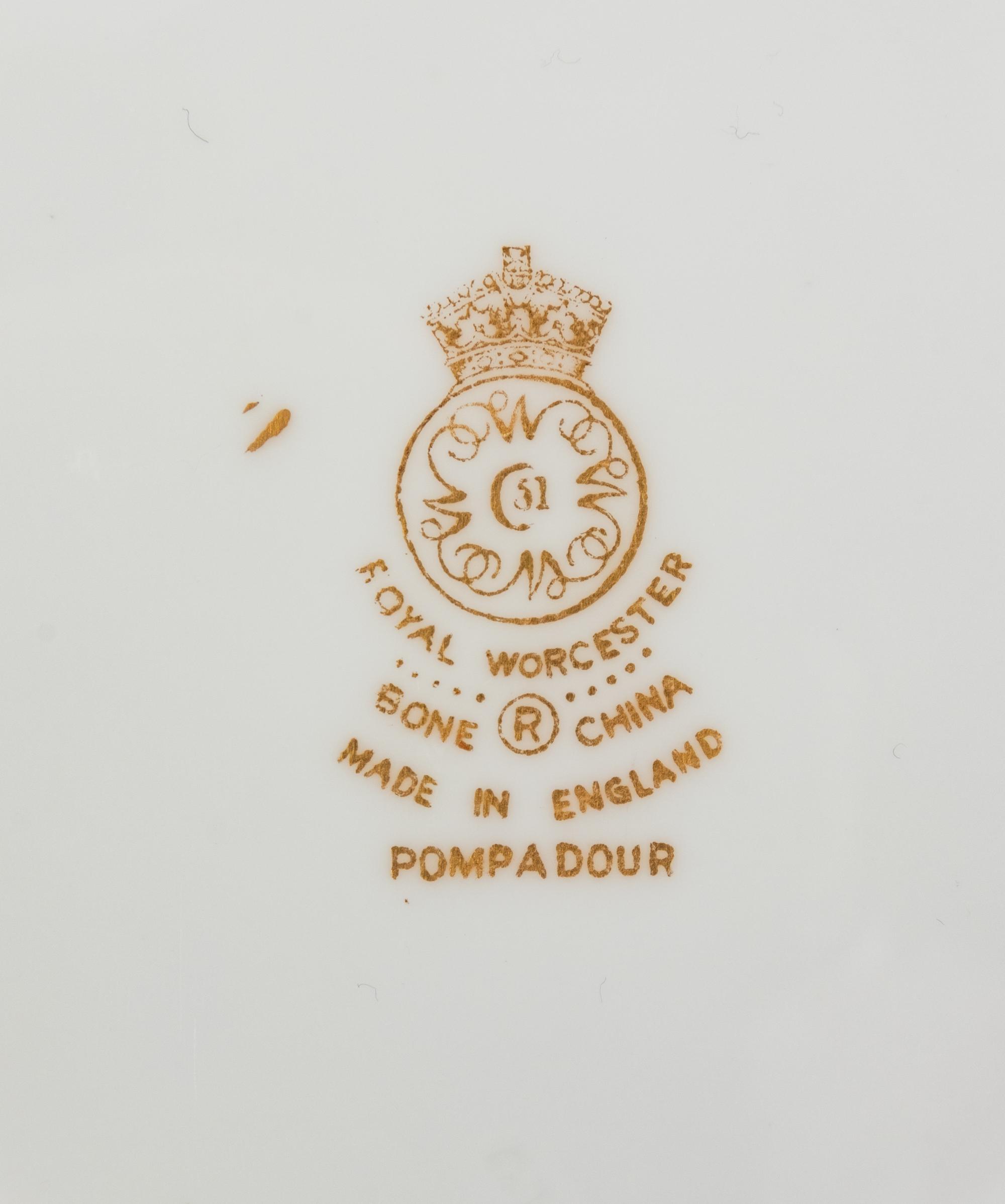 A Royal Worcester Pompadour Porcelain Dinner Service