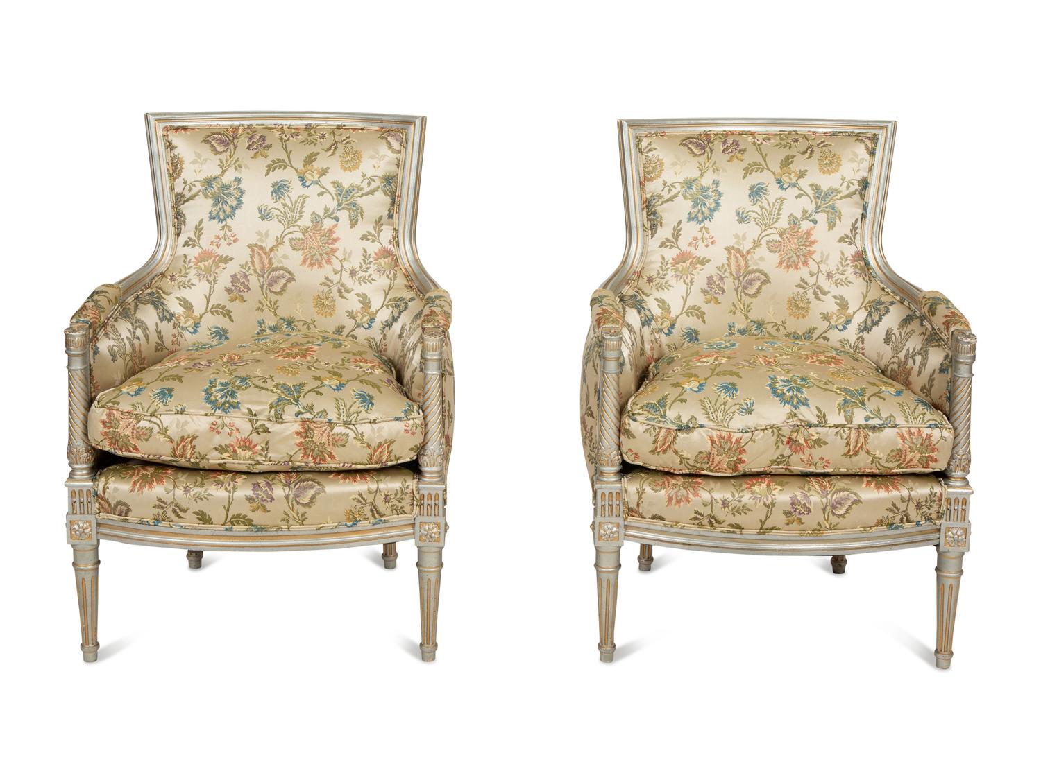 A Pair of Louis XVI Style Painted and Parcel Gilt Bergères