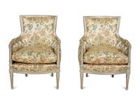 A Pair of Louis XVI Style Painted and Parcel Gilt Bergères