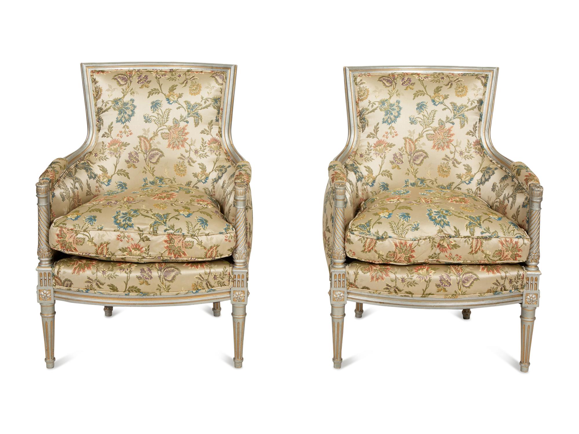 A Pair of Louis XVI Style Painted and Parcel Gilt Bergères