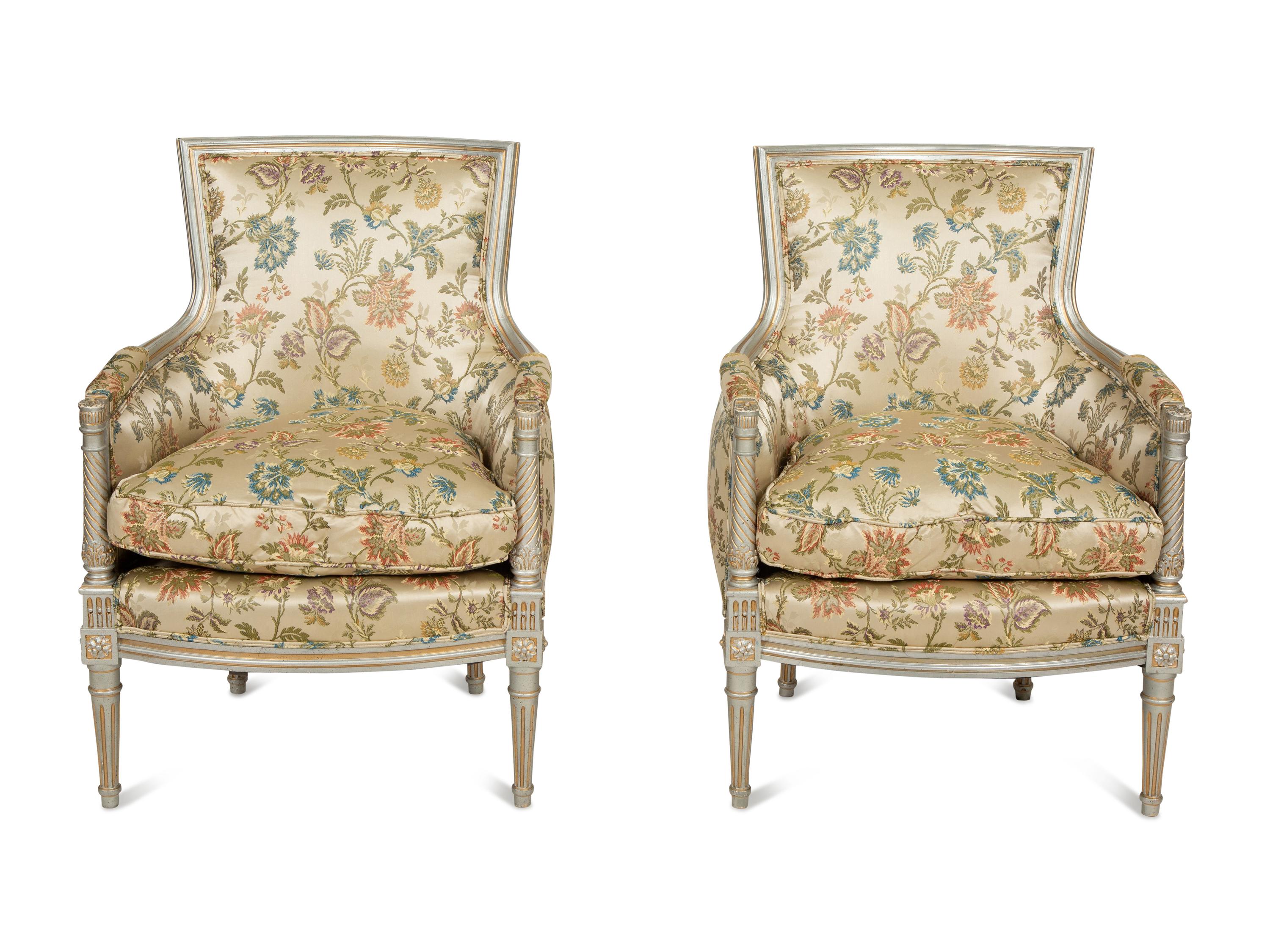 A Pair of Louis XVI Style Painted and Parcel Gilt Bergères