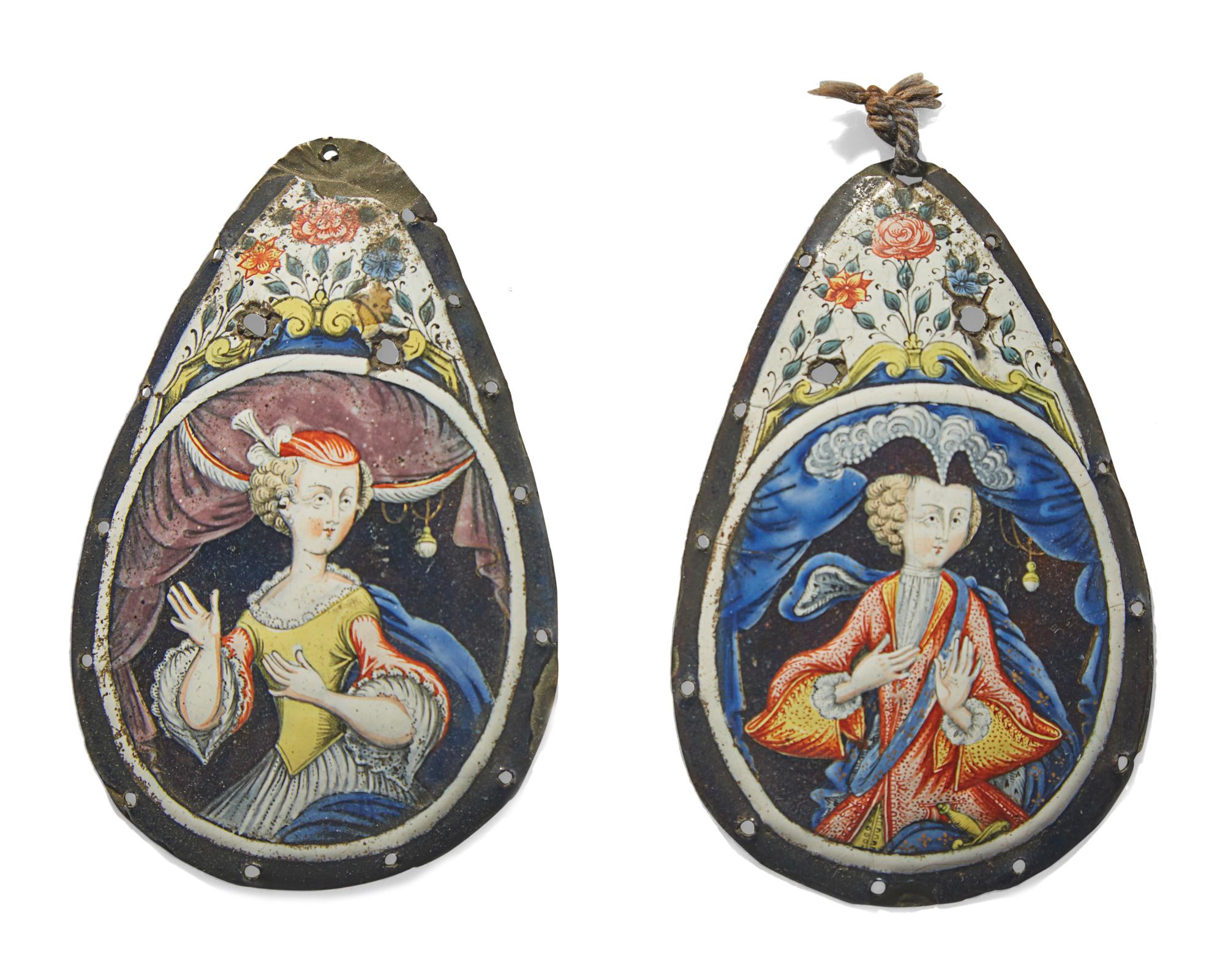 A pair of Continental enameled metal pendants, early 18th century