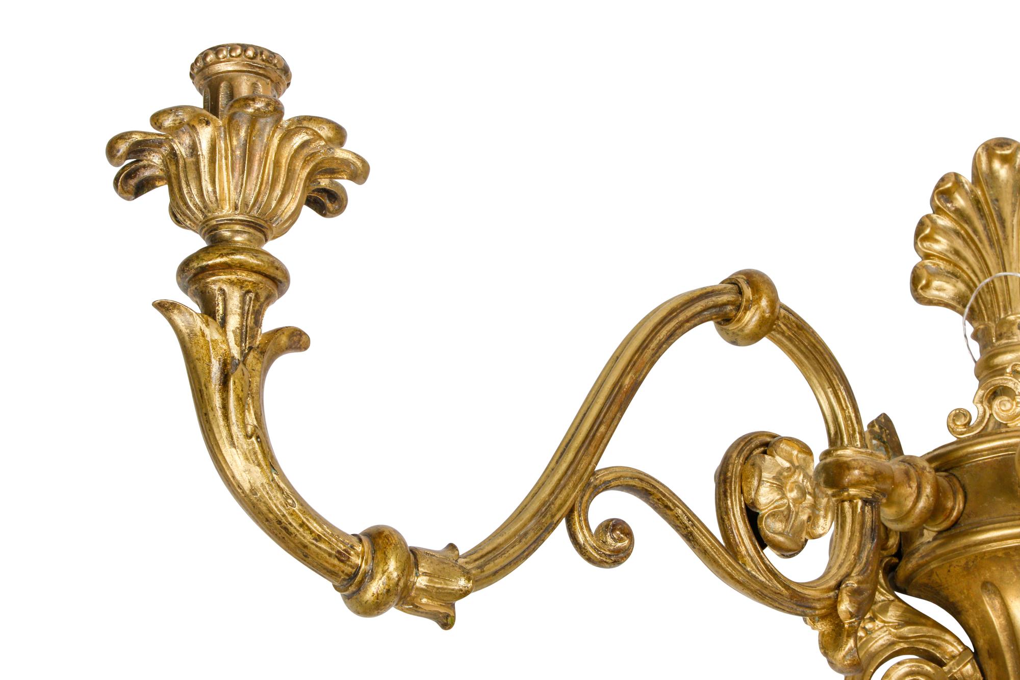 A Set of Four Large Gilt Bronze Three-Light Sconces