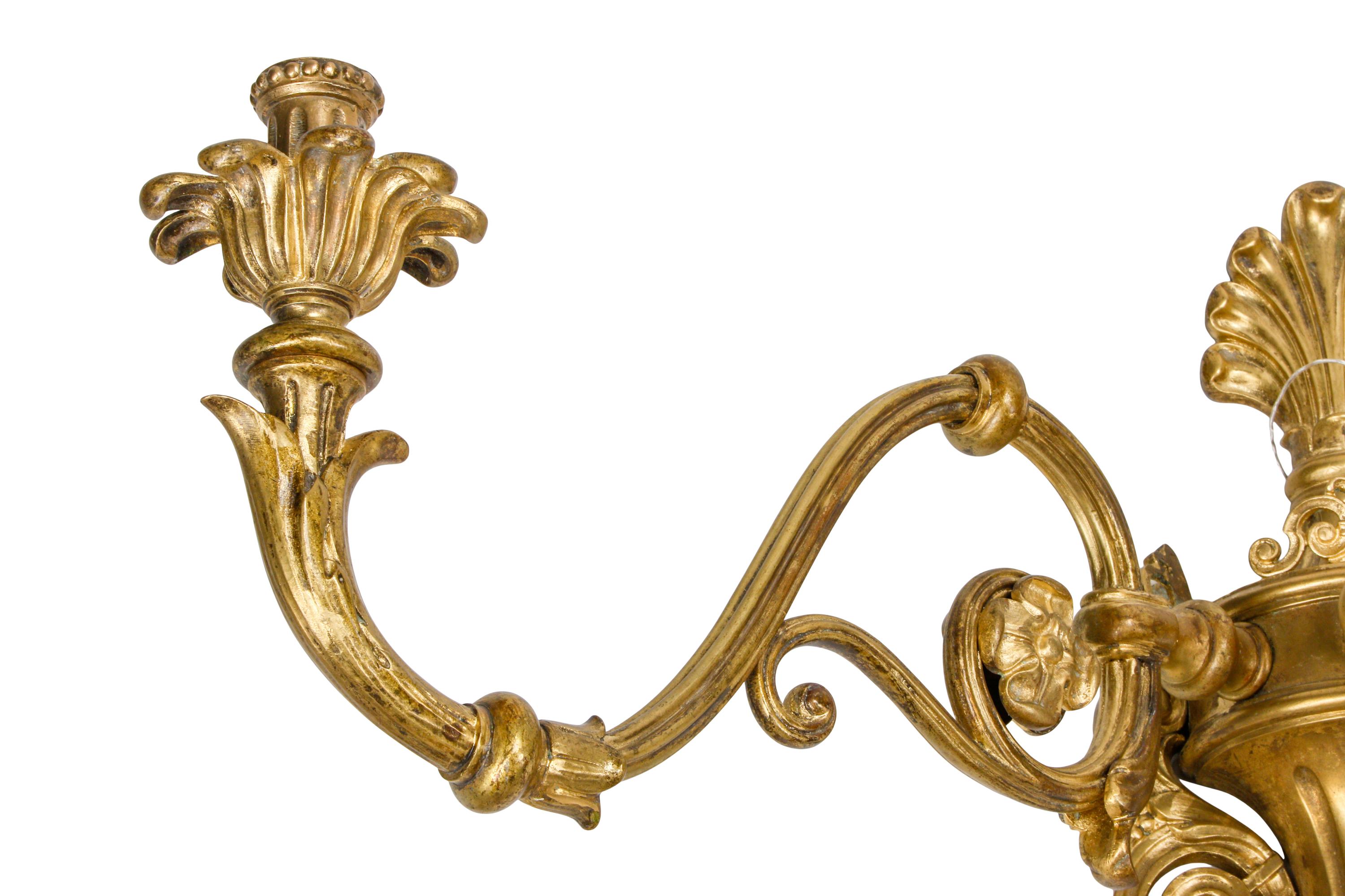 A Set of Four Large Gilt Bronze Three-Light Sconces