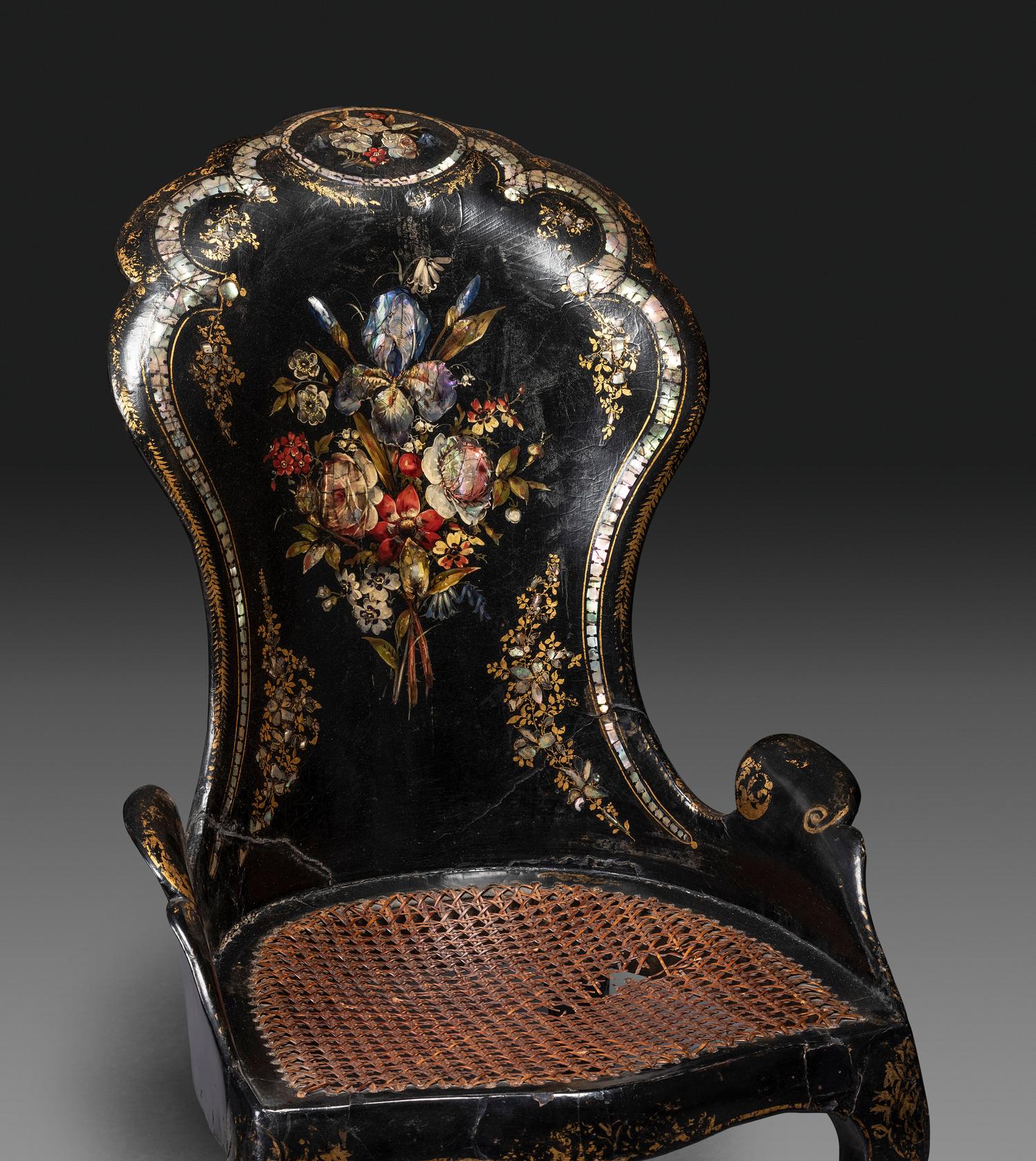 Two Victorian Black Lacquered Parcel-Gilt and Mother-of-Pearl Inlaid Cane Upholstered Slipper Chairs