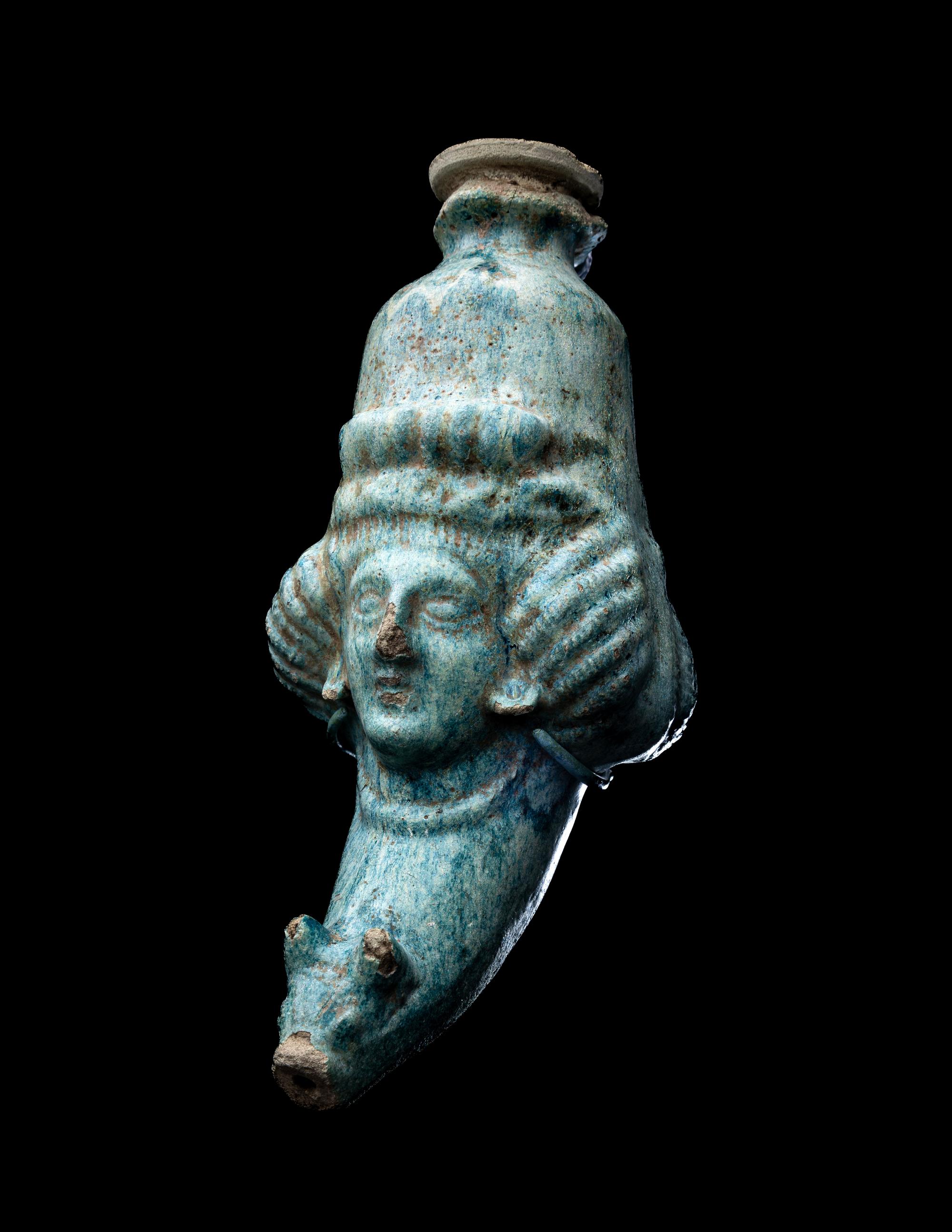 A Parthian or Sasanian Turquoise-Glazed Rhyton