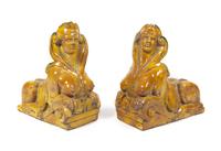 A Pair of English Glazed Terra Cotta Figures
