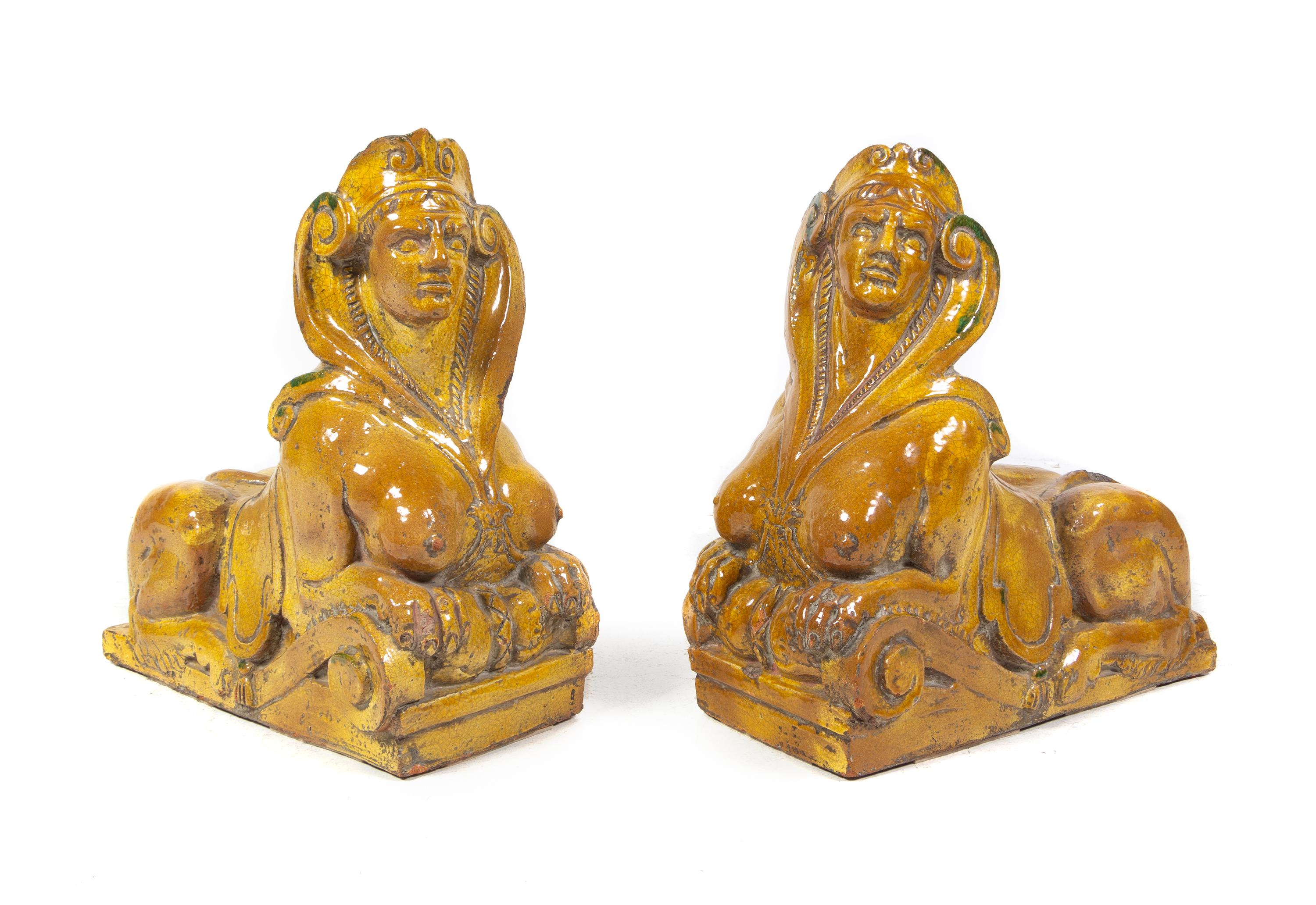 A Pair of English Glazed Terra Cotta Figures