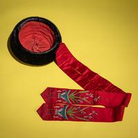An Embroidered Silk Manchu Noblewoman's Winter Hat, Kunqiumao , 19th Century — 清晚期 紫頂蓋花鑲珠后妃坤秋帽