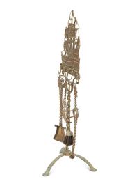 A Mizner Wrought Iron Fireplace Stand with Five Implements