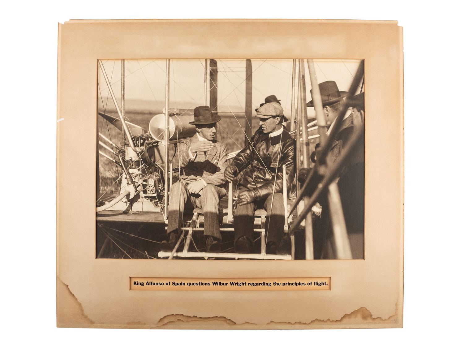 [AVIATION] -- [WRIGHT BROTHERS]. A group of 2 photographs, incl. views of Wilbur Wright and a Wright airplane, 1909.