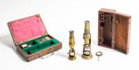Two Cased and Lacquered Brass Drum Microscopes Height of taller 8 inches. — 19TH CENTURY