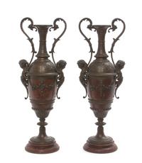 A Pair of Neoclassical Bronzed Urns, Height 15 inches.