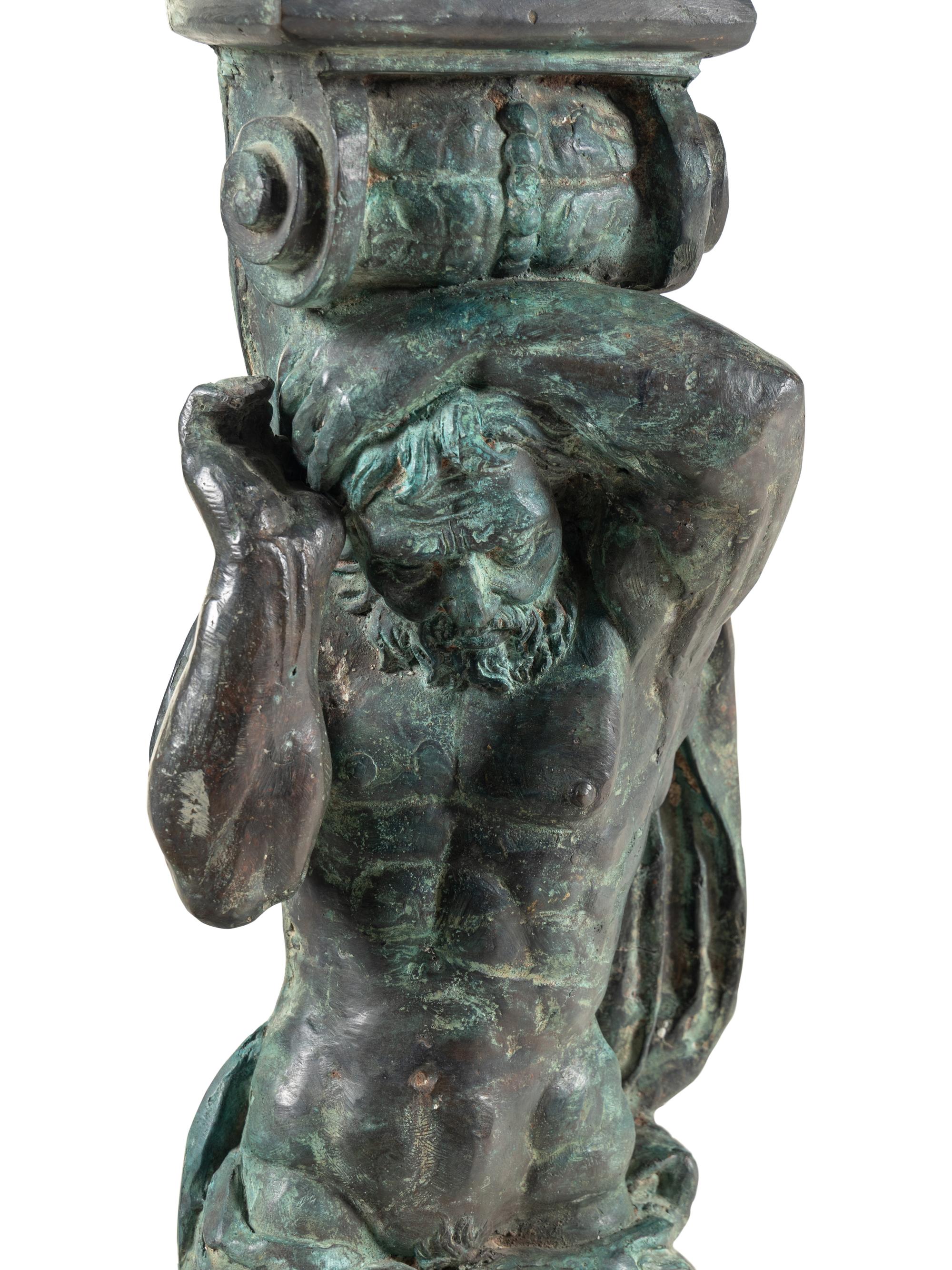 A Pair of Continental Cast Metal Figural Pedestals