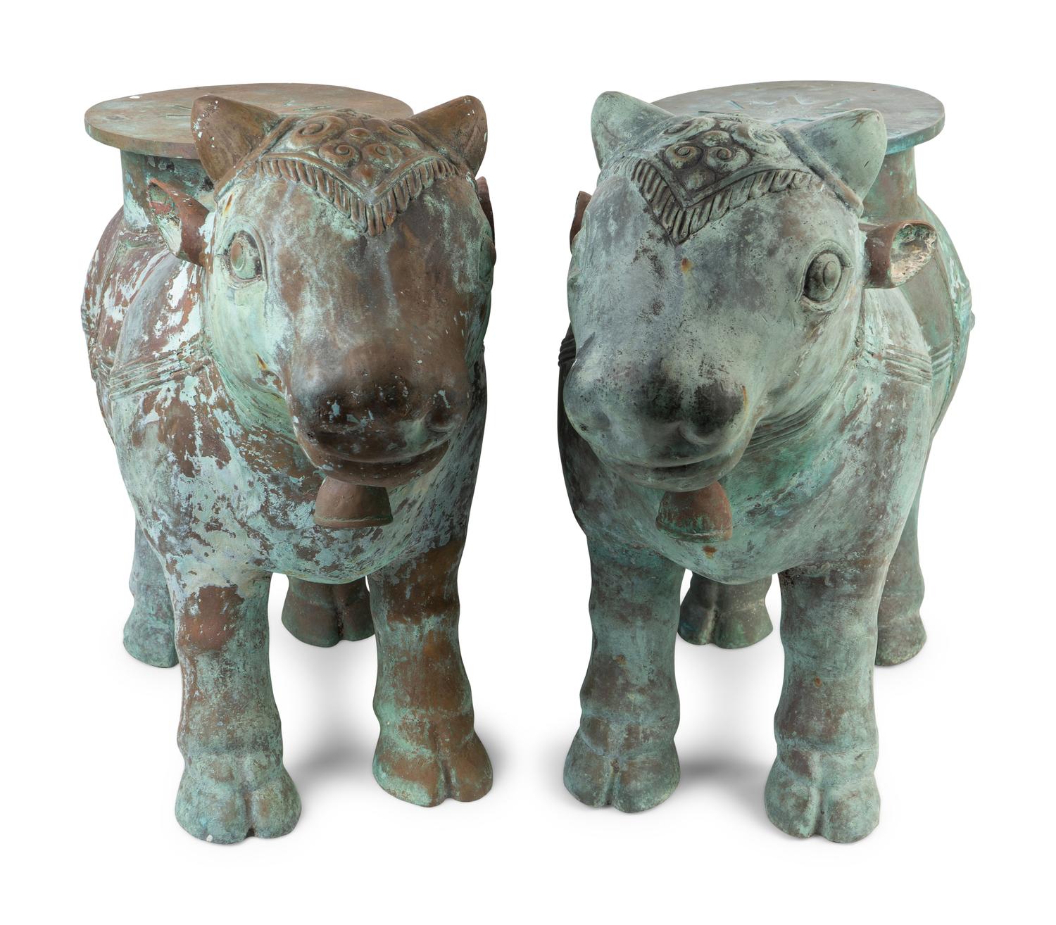 A Pair of Indian Sacred Cow-Form Metal Garden Seats