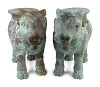 A Pair of Indian Sacred Cow-Form Metal Garden Seats