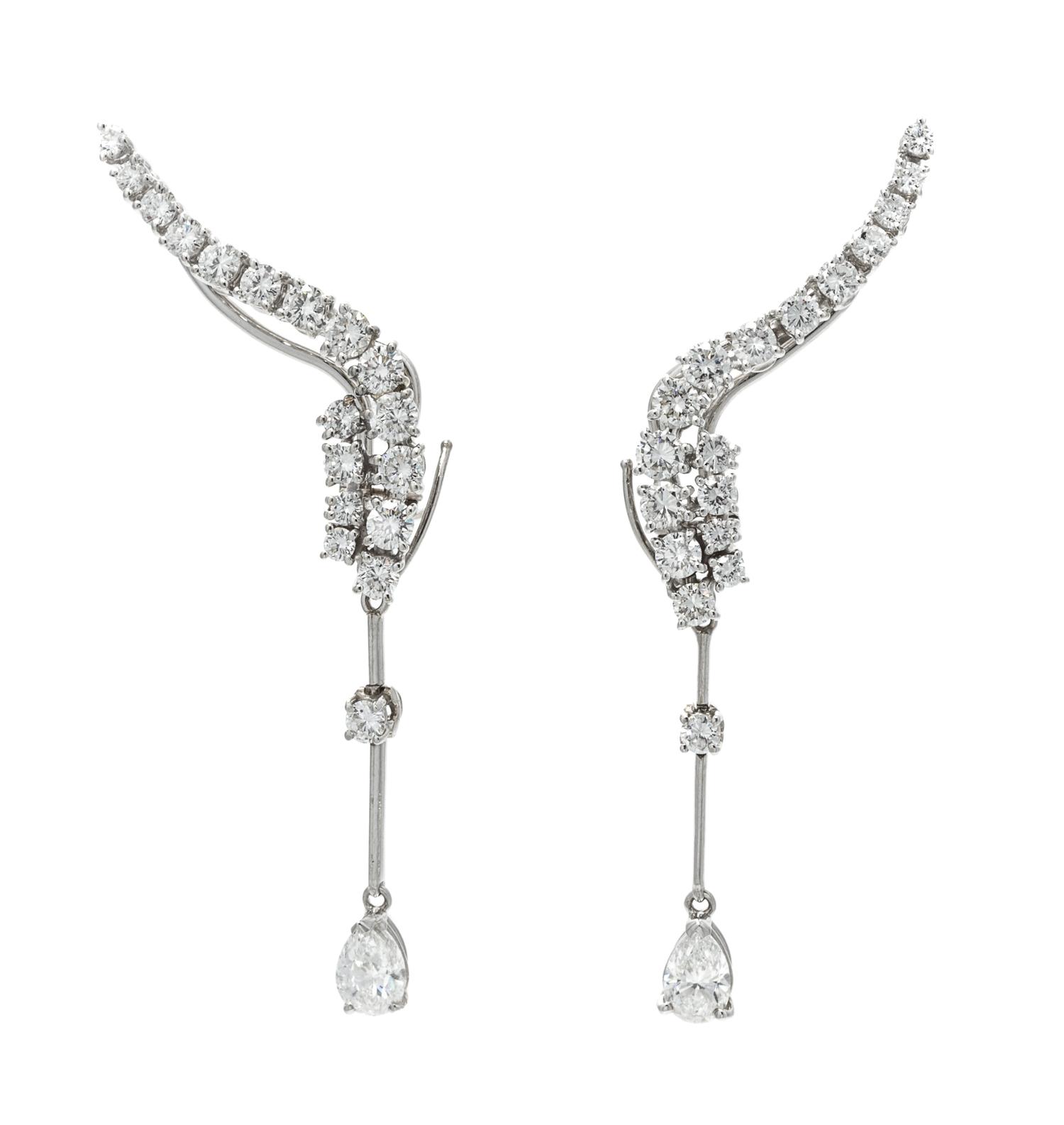A Pair of 18 Karat White Gold and Diamond "Waterfall" Earclips, Stefan Hafner, 7.00 dwts.