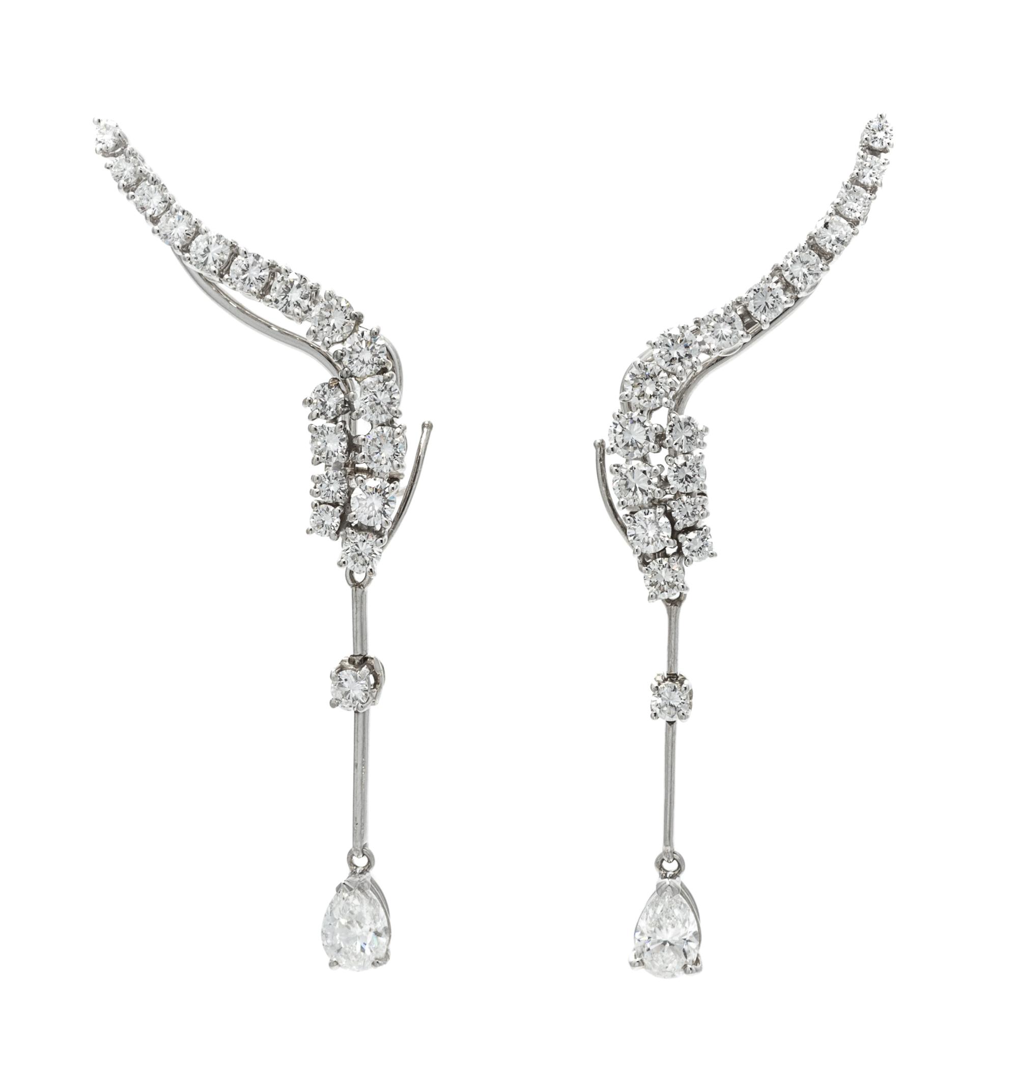 A Pair of 18 Karat White Gold and Diamond "Waterfall" Earclips, Stefan Hafner, 7.00 dwts.