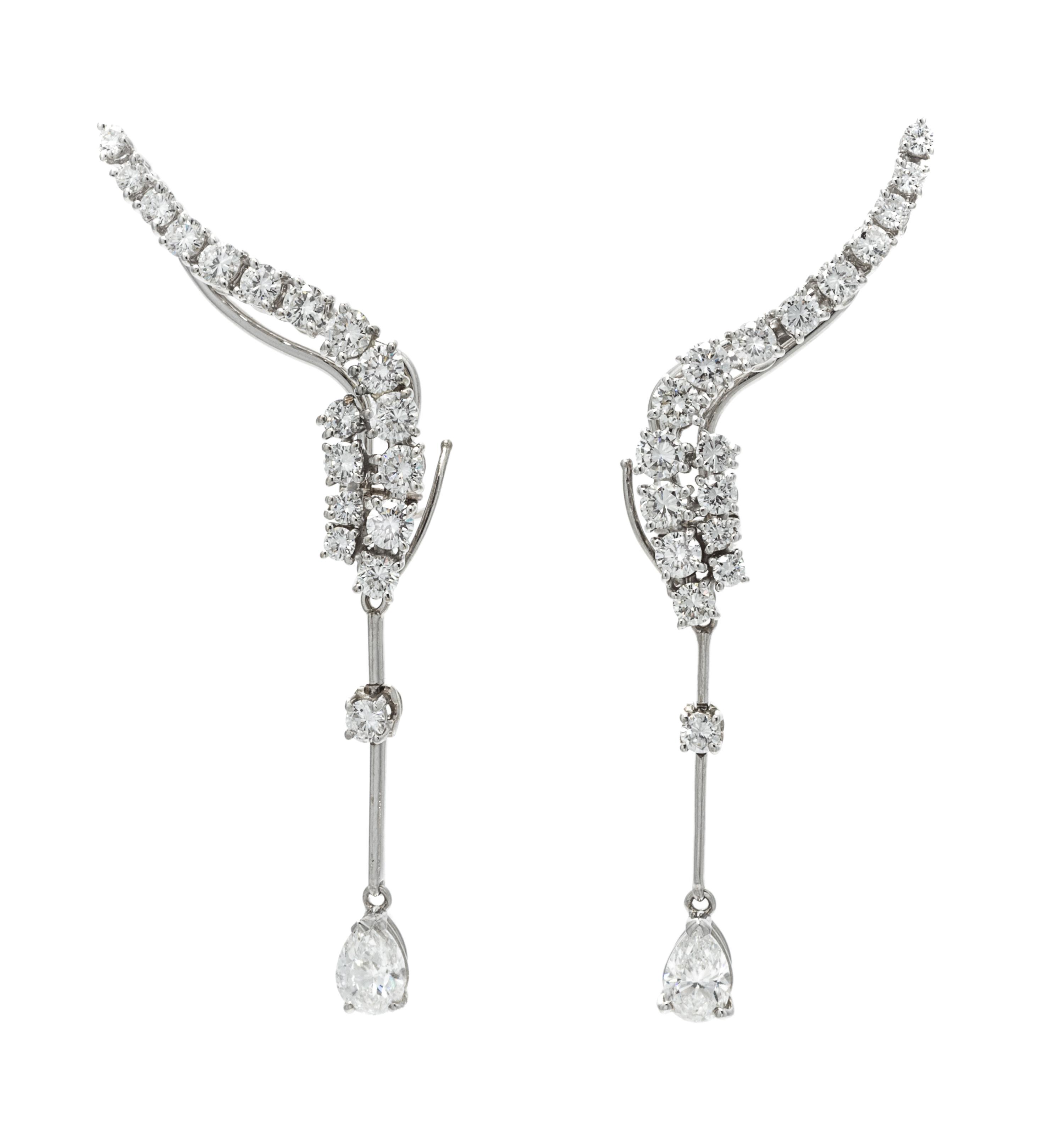 A Pair of 18 Karat White Gold and Diamond "Waterfall" Earclips, Stefan Hafner, 7.00 dwts.