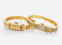 A Set of Two Vintage 18K Yellow Gold Bangle Watches