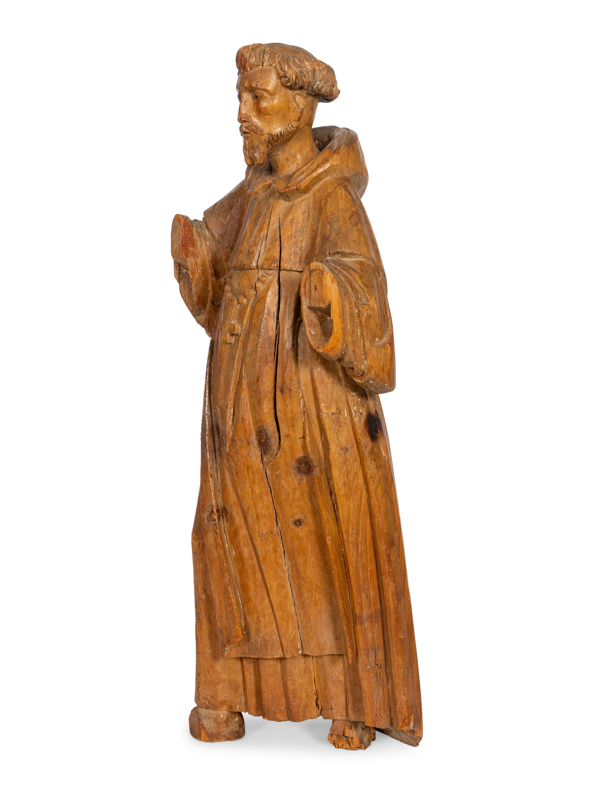 A Continental Carved Santos Figure