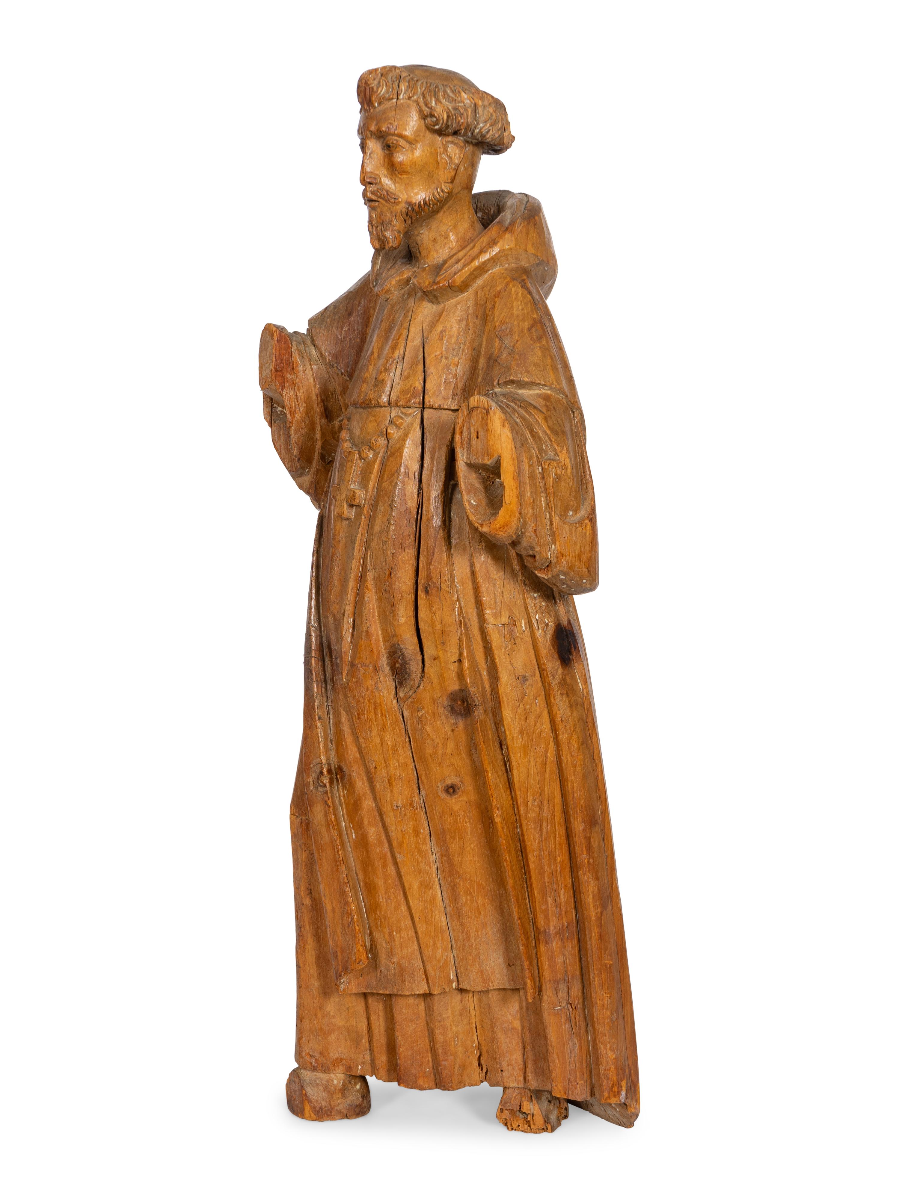 A Continental Carved Santos Figure