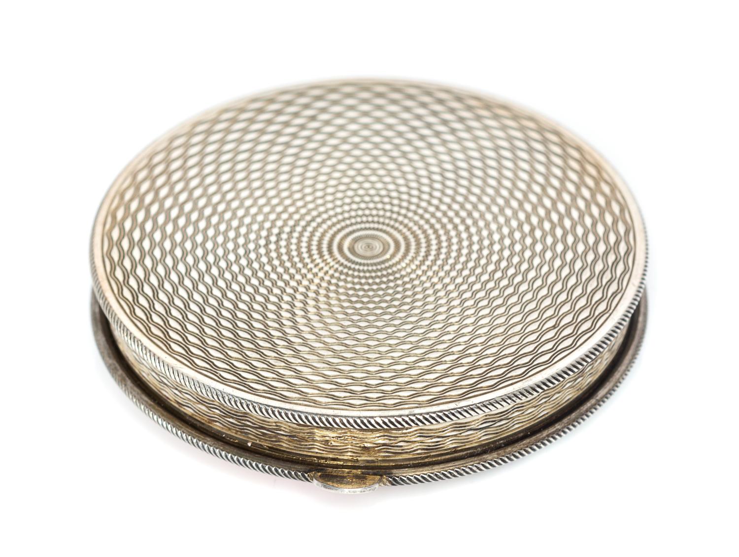 A Continental Silver and Enamel Compact, Import Mark GS, London, 1925, the lid enameled with bamboo shoots, dragonflies and four Chines