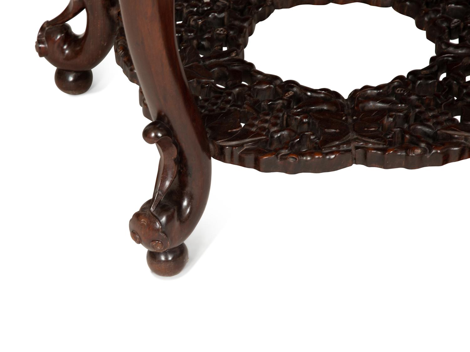 A Chinese Carved Hardwood Center Table and Four Matching Low Stools/Pedestals