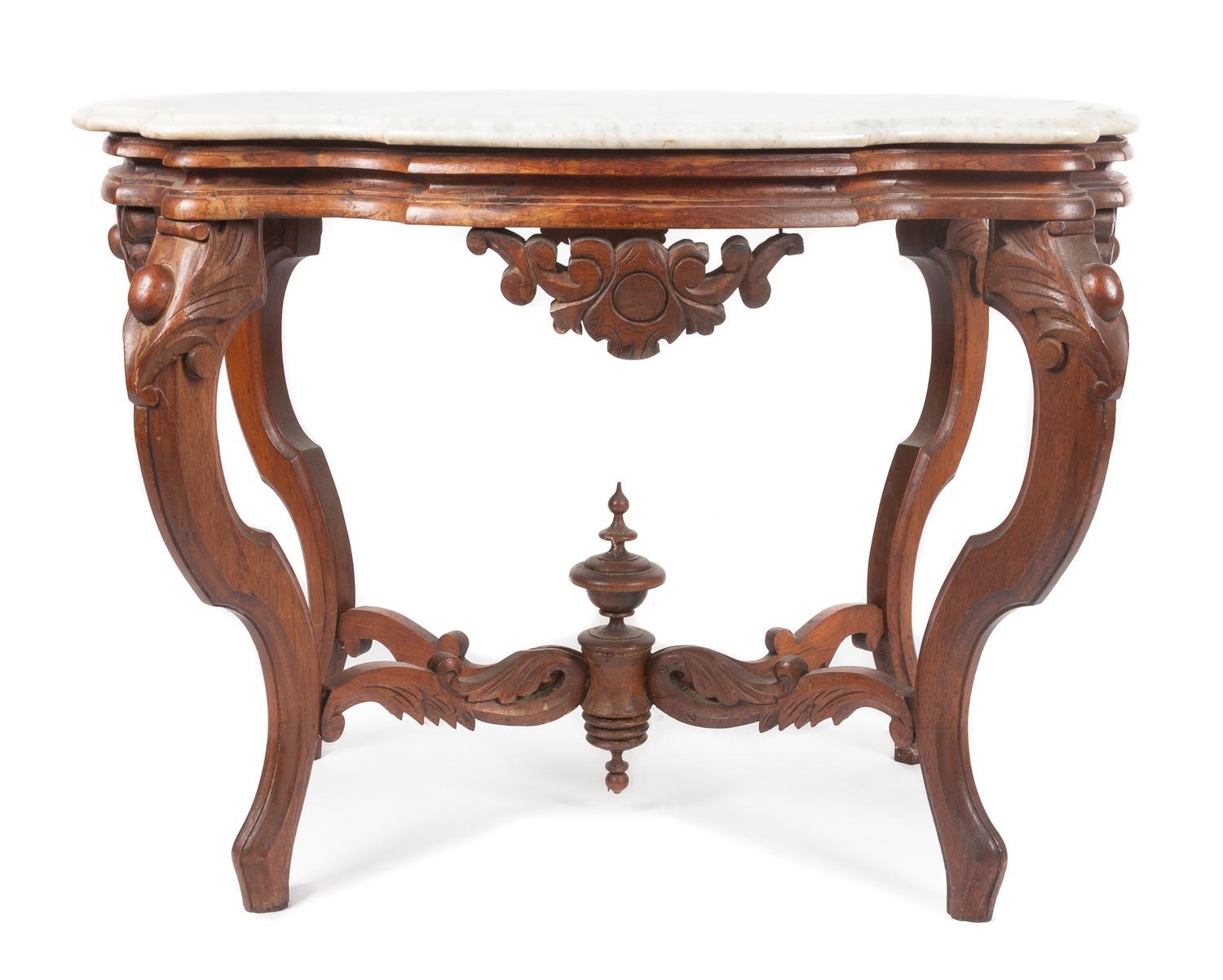 A Victorian Walnut Parlor Table Height 27 x width 35 x depth 24 inches. — 19TH/20TH CENTURY