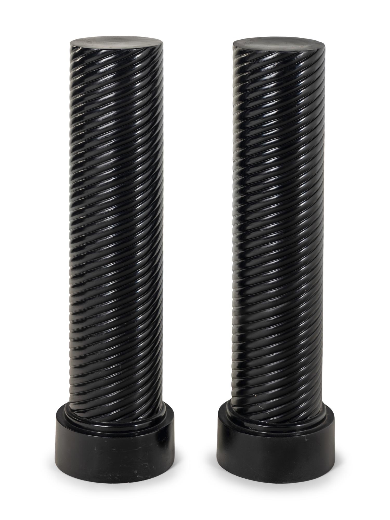 A Pair of Black Painted Composition Pedestals