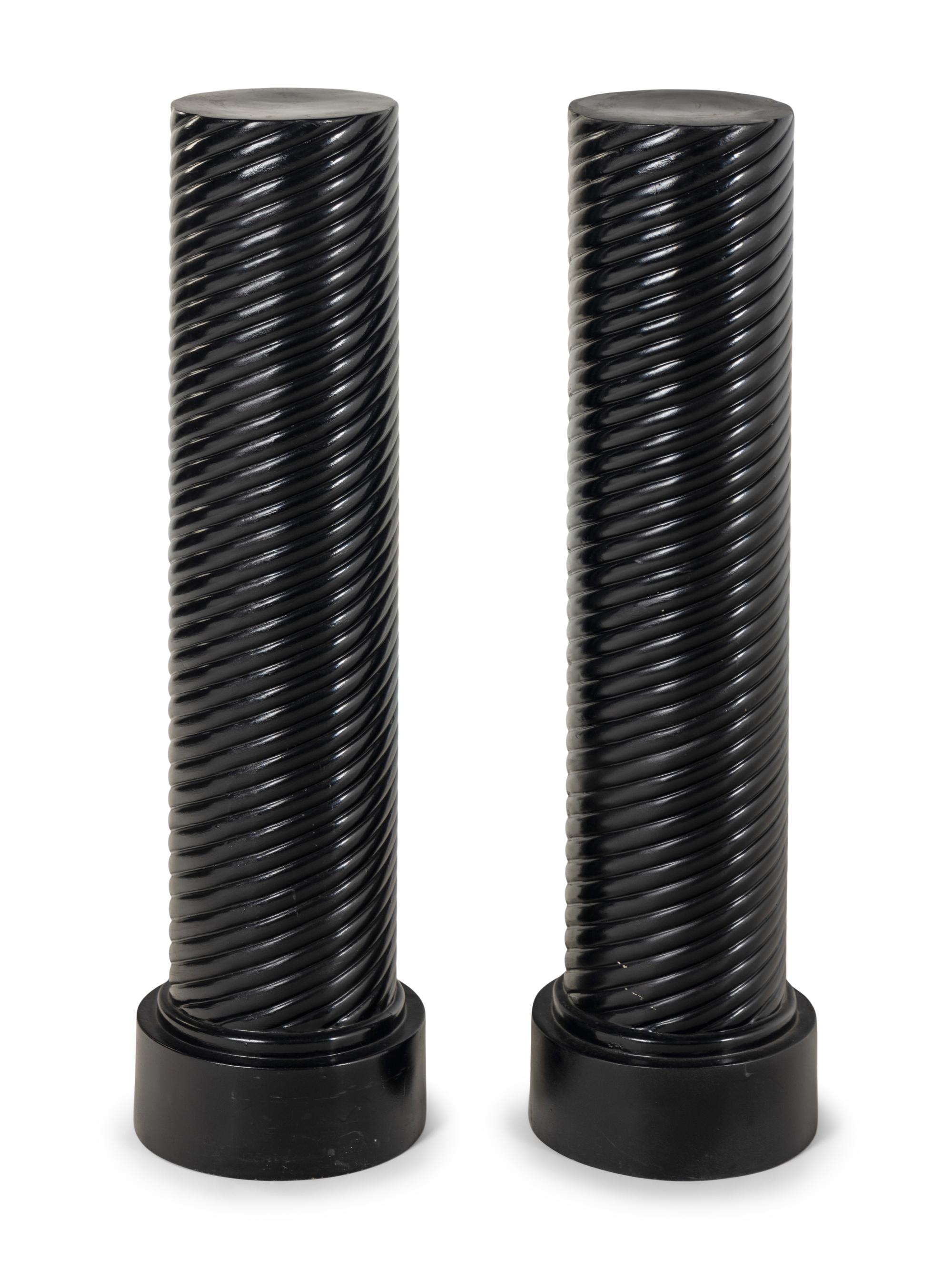 A Pair of Black Painted Composition Pedestals
