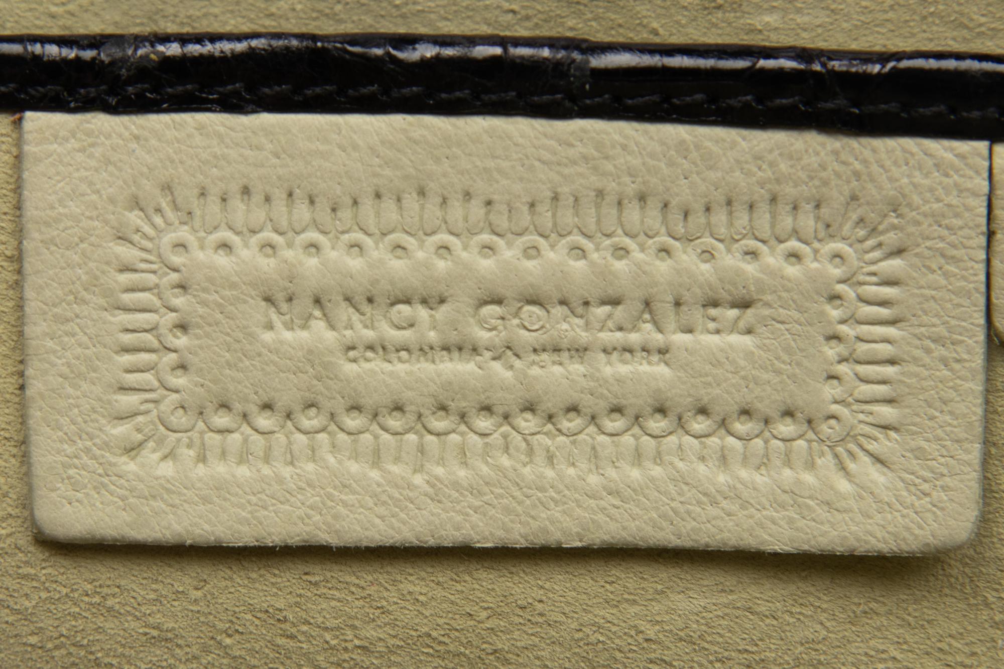 Two Nancy Gonzalez Clutches and One Chanel Zip Pouch