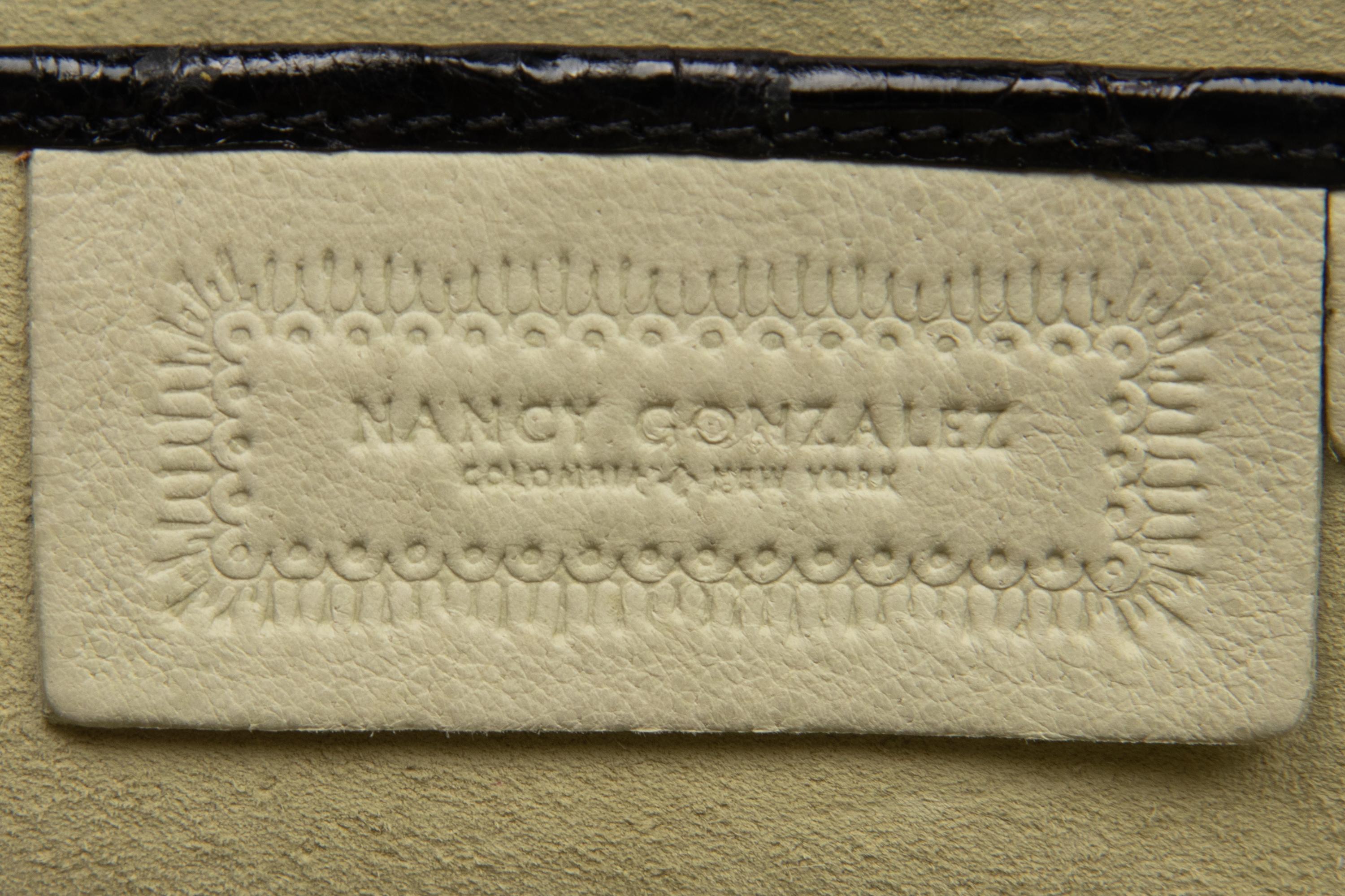 Two Nancy Gonzalez Clutches and One Chanel Zip Pouch