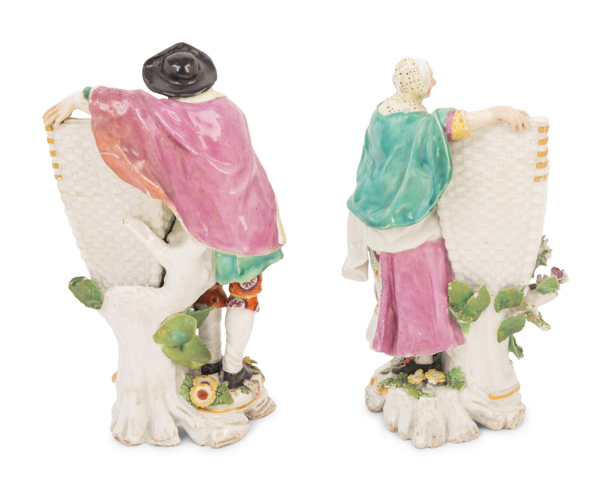 A Pair of Chelsea Porcelain Figures