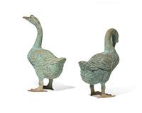 A pair of cast zinc garden statues of geese, 20th century